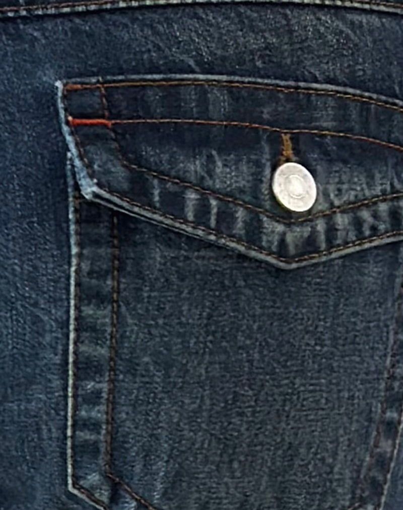 Extra Low Rise Twisted Seam Jeans in Mid Blue Tint