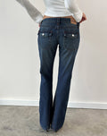 Extra Low Rise Twisted Seam Jeans in Mid Blue Tint