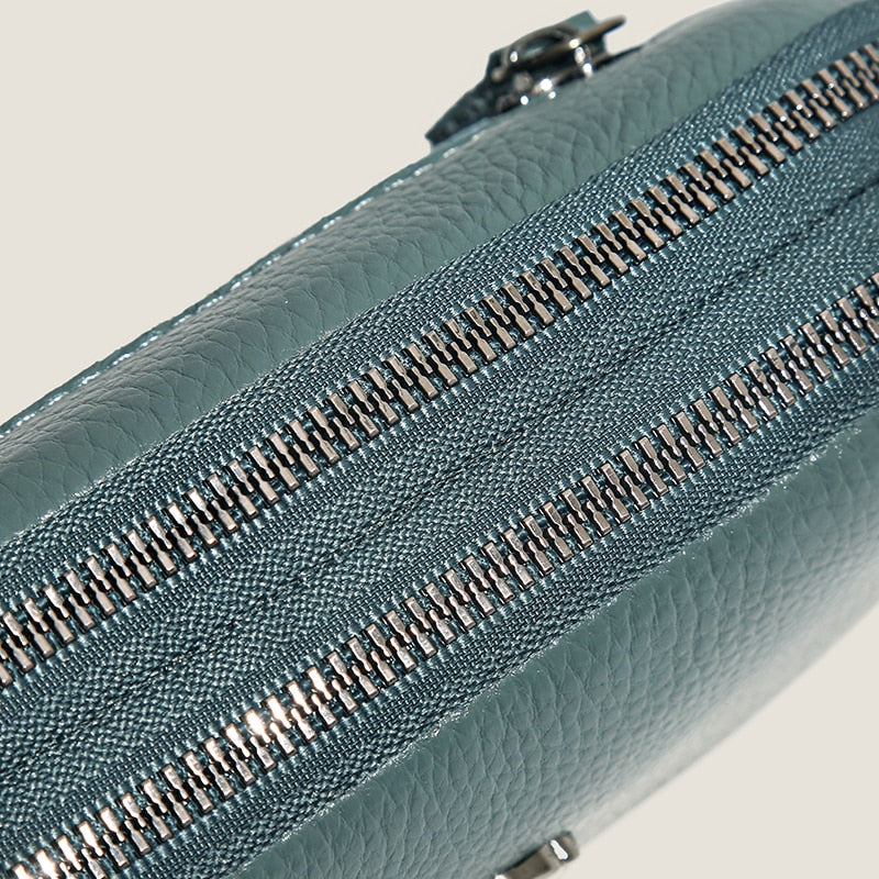 Le Sac à Bandoulière Femme en Cuir